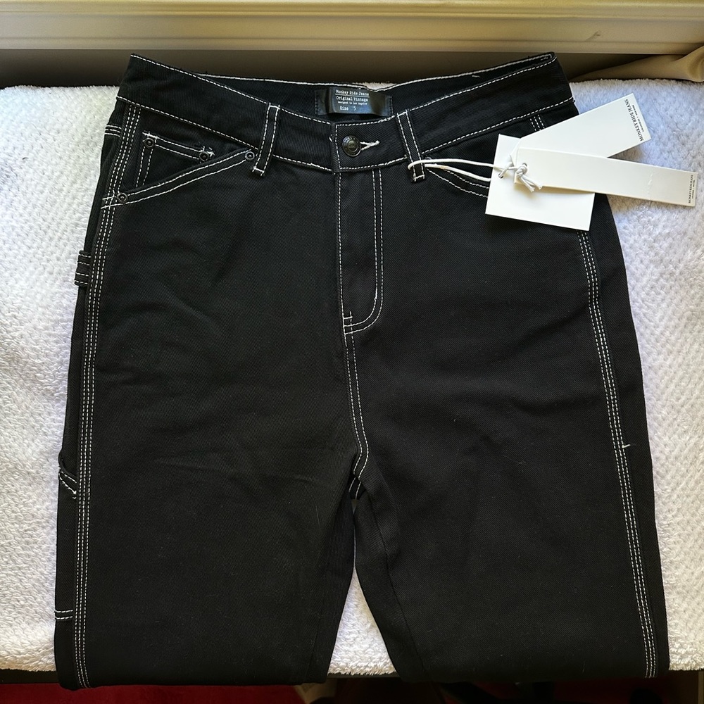 Black carpenter’s style pants